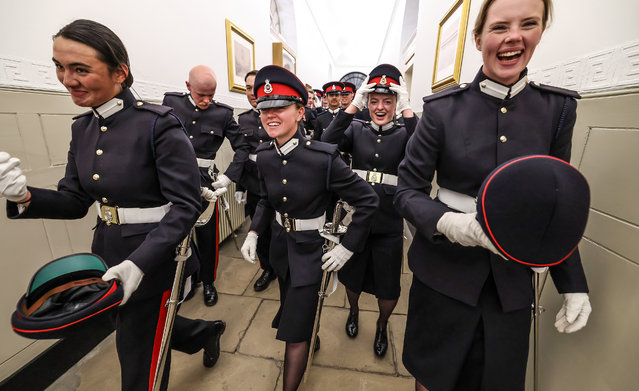 Officer cadets at Sandhurst military academy celebrate completing the Sovereign's Parade which see's them become commissioned officers in the army on April 11, 2025. The parade marks the completion of 44 weeks of intensive training for the Officer Cadets of Commissioning Course 242, all of whom will officially hold HM the King's Commission as of the stroke of midnight on the day of the parade. In addition, there are 26 international cadets from 18 countries. (Photo by Times photographer Richard Pohle)