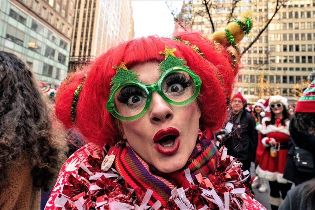 Revelers take part in SantaCon in New York City, U.S., December 10, 2022. (Photo by David “Dee” Delgado/Reuters)