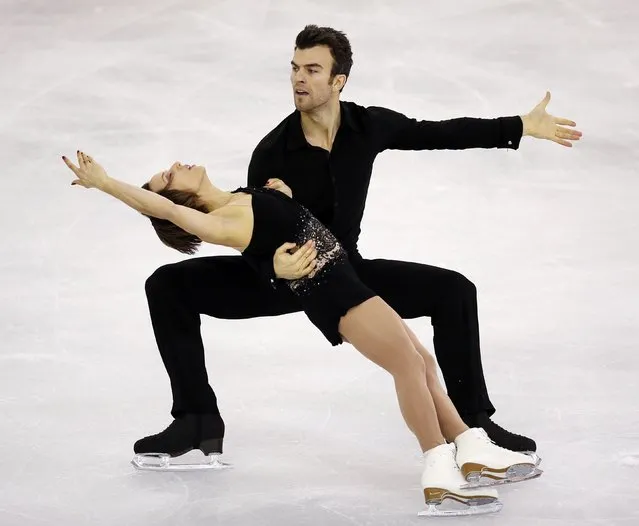 Canada's Meagan Duhamel and Eric Radford perform during the Ice Pairs free skating at the ISU Grand Prix of Figure Skating final in Barcelona December 13, 2014. (Photo by Albert Gea/Reuters)