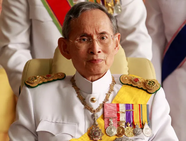 Thailand's King Bhumibol Adulyadej leaves the Siriraj Hospital for a ceremony at the Grand Palace in Bangkok in this December 5, 2010 file photo. (Photo by Sukree Sukplang/Reuters)