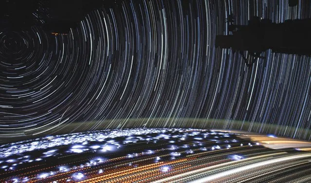 This image of star trails was compiled from time-lapse photography taken by NASA astronaut Christina Koch from aboard the International Space Station, taken in July 2019. On the ground, stationary features like cities appear as pale yellow-white dotted streaks with each dot marking another frame captured. Many of the thinner dotted lines with darker orange hues are fires burning across Angola and the Democratic Republic of the Congo. (Photo by NASA)