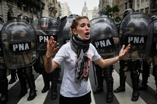 A demonstrator reacts during a protest near the National Congress, on the day Senators debate Argentina's President Javier Milei's economic reform bill, known as the “omnibus bill”, in Buenos Aires, Argentina, on June 12, 2024. (Photo by Mariana Nedelcu/Reuters)