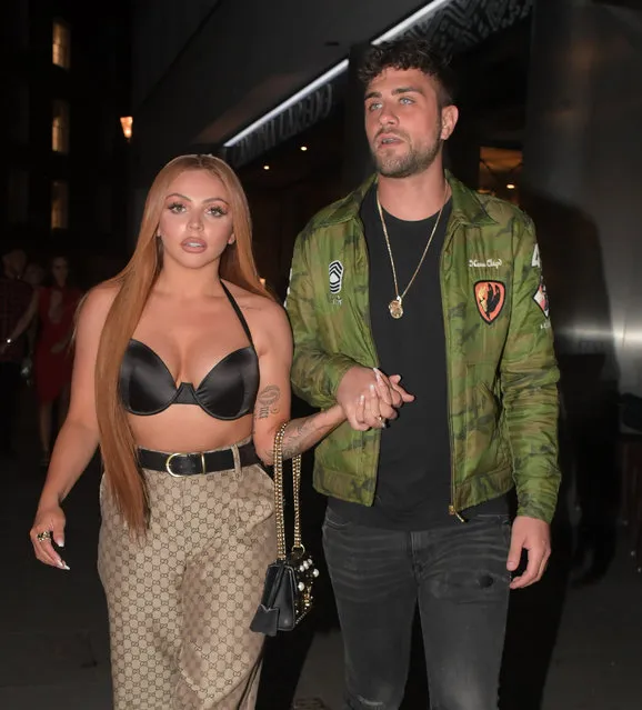 Little Mix Star Jesy Nelson and her boyfriend Harry James seen leaving Cantrina Lagredo Restaurant in London following a romantic meal out on April 29, 2018. Jesy was seen leaving the eatery wearing Gucci trousers and a black Bra flashing ample cleavage. (Photo by Splash News and Pictures)