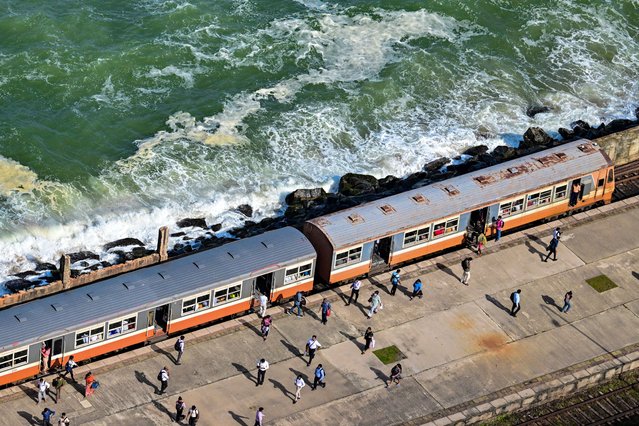A train arrives at a station in Colombo, Sri Lanka on June 4, 2025. (Photo by Ishara S. Kodikara/AFP Photo)