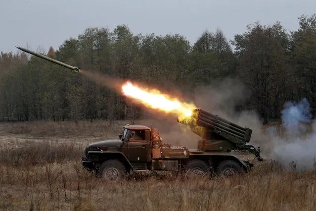 Ukrainian servicemen fire a BM-21 Grad multiple rocket launcher system during military exercises near the village of Divychky in Kiev region, Ukraine, October 28, 2016. (Photo by Valentyn Ogirenko/Reuters)