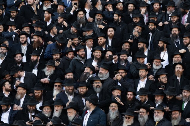 Thousands of rabbis attending the 42nd annual International Conference of Chabad-Lubavitch Emissaries (Kinus Hashluchim) pose for a group photo on November 16, 2025 in New York. (Photo by Erik Pendzich/Rex Features/Shutterstock)