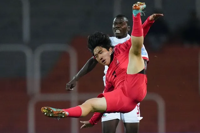 South Korea's Kim Yong-hak falls during a FIFA U-20 World Cup Group F soccer match against Gambia at the Malvinas Argentinas stadium in Mendoza, Argentina, Sunday, May 28, 2023. (Photo by Natacha Pisarenko/AP Photo)