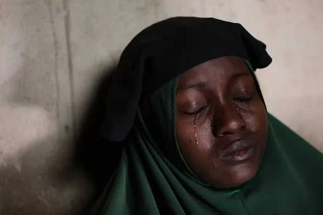 Humaira Mustapha, whose 2 daughters were kidnapped by gunmen at the Government Girls Secondary School, cries at her home, the day after the abduction of over 300 schoolgirls in Jangebe, a village in Zamfara State, northwest of Nigeria on February 27, 2021. More than 300 schoolgirls were snatched from dormitories by gunmen in the middle of the night in northwestern Zamfara state on February 26, in the third known mass kidnapping of students since December. (Photo by Kola Sulaimon/AFP Photo)