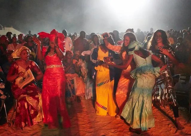 Festivalgoers dancing at Baaba Maal's show. (Photo by Andy Hall/The Observer)
