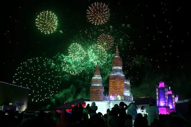 Fireworks display over the ice sculptures at Harbin ice and snow world during the opening ceremony of the 32nd Harbin International Ice and Snow Festival in Harbin city, China's northern Heilongjiang province, 05 January 2016. (Photo by Wu Hong/EPA)