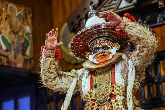 A Kathakali dancer in Kochi, India, performs a traditional story play on August 10, 2023. Kerala Kathakali originated in the Early 17th Century. A story acted that contains Mime, Acting Drama and music, The Stories are mainly taken from Hindu Mythology and Puranas. (Photo by Paul Quezada-Neiman/Alamy Live News)
