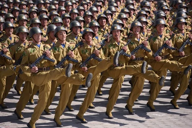 Korean People' s Army (KPA) soldiers march during a mass rally on Kim Il Sung square in Pyongyang on September 9, 2018. (Photo by Ed Jones/AFP Photo)