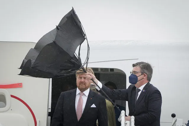King Willem-Alexander of the Netherlands and Queen Maxima arrive at the Brandenburg Airport in Berlin, Germany, Monday, July 5, 2021. The Royals arrived in Germany for a three-day visit that was delayed from last year because of the coronavirus pandemic. (Photo by Kay Nietfeld/dpa via AP Photo)
