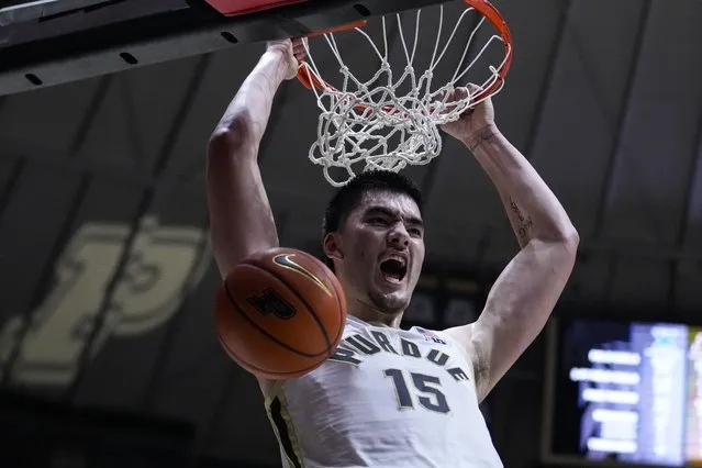 Purdue center Zach Edey (15) gets a basket on a dunk against Xavier during the second half of an NCAA college basketball game in West Lafayette, Ind., Monday, November 13, 2023. Purdue defeated Xavier 83-71. (Photo by Michael Conroy/AP Photo)
