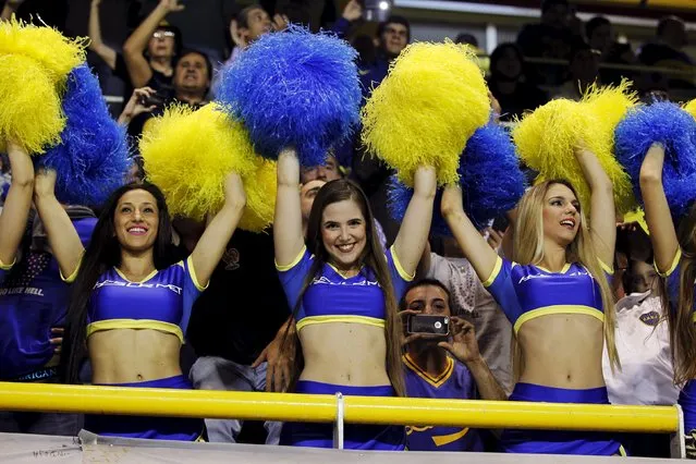 Boca Juniors cheerleaders perform before the start of the Copa Libertadores soccer match between Argentina's Boca Juniors and Chile's Palestino in Buenos Aires, April 16, 2015. (Photo by Agustin Marcarian/Reuters)