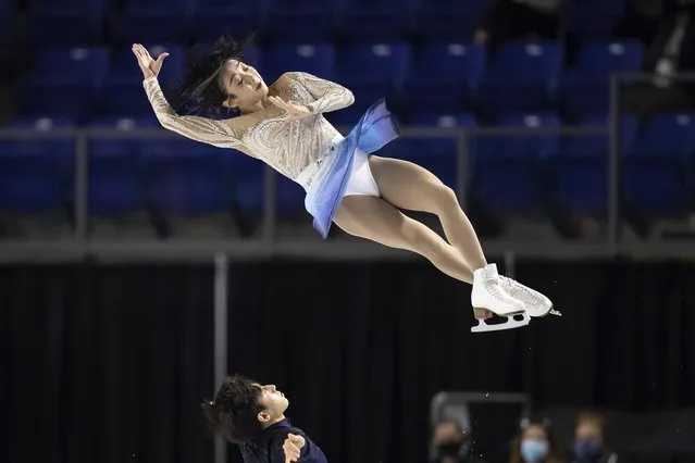 China's Sui Wenjing and Han Cong perform their pairs free skating program during the Skate Canada International figure skating competition in Vancouver, British Columbia, Saturday, October 30, 2021. (Photo by Darryl Dyck/The Canadian Press via AP Photo)