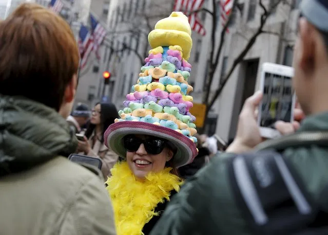 People take part in the annual Easter Parade and Bonnet Festival along 5th Avenue in New York City March 27, 2016. (Photo by Brendan McDermid/Reuters)