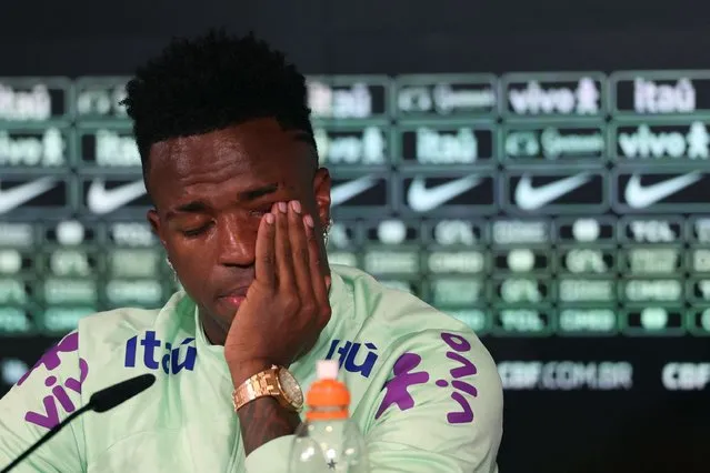 Brazil's forward Vinicius Junior cries as he gives a press conference on the eve of the international friendly football match between Spain and Brazil at the Ciudad Real Madrid training ground in Valdebebas, outskirts of Madrid, on March 25, 2024. Spain arranged a friendly against Brazil at the Santiago Bernabeu under the slogan “One Skin” to help combat racism. (Photo by Pierre-Philippe Marcou/AFP Photo)