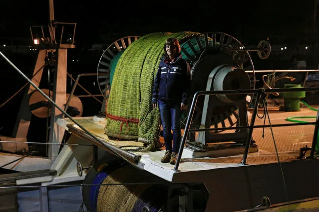 Raquel Gomez Delgado, 43, a marine fishing inspector, poses on board a fishing boat at Punta del Moral port in Huelva, Spain, February 22, 2017. “In my opinion the only way to end gender inequality is through education in schools and bringing us examples of equality (in the media)”, Delgado said. (Photo by Juan Medina/Reuters)