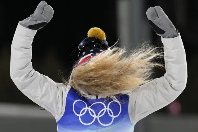 Jessie Diggins celebrates during a venue ceremony after winning the bronze medal in the women's sprint free cross-country skiing competition at the 2022 Winter Olympics, Tuesday, February 8, 2022, in Zhangjiakou, China. (Photo by Alessandra Tarantino/AP Photo)
