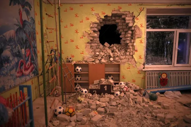 An interior view shows a kindergarten, which according to Ukraine's military officials was damaged by shelling, in Stanytsia Luhanska, in the Luhansk region, Ukraine, February 17, 2022. (Photo by Carlos Barria/Reuters)