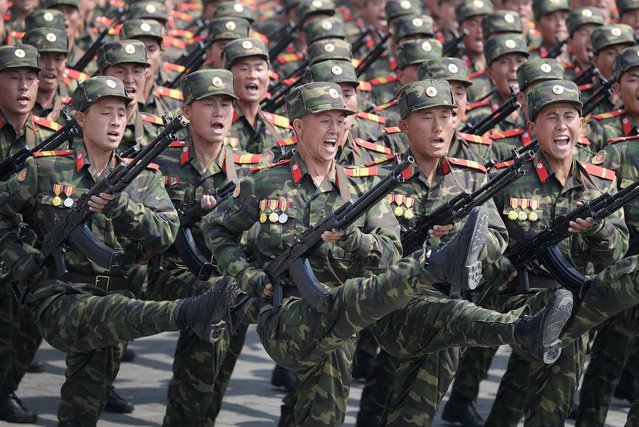 Soldiers shout as they march across Kim Il Sung Square during a military parade on Saturday, April 15, 2017, in Pyongyang, North Korea to celebrate the 105th birth anniversary of Kim Il Sung, the country's late founder and grandfather of current ruler Kim Jong Un. (Photo by Wong Maye-E/AP Photo)