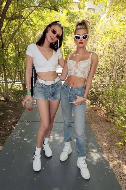 American model Bella Hadid and American model and television personality Hailey Baldwin at Levi's Coachella Brunch Event 2018 in Palm Springs, USA on April 14, 2018. (Photo by Eric Charbonneau/Rex Features/Shutterstock)