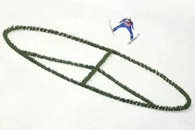Slovenia's Timi Zajc competes during the final round of the FIS Ski Flying World Cup in Oberstdorf, Germany, Saturday, March 19, 2022. (Photo by Matthias Schrader/AP Photo)