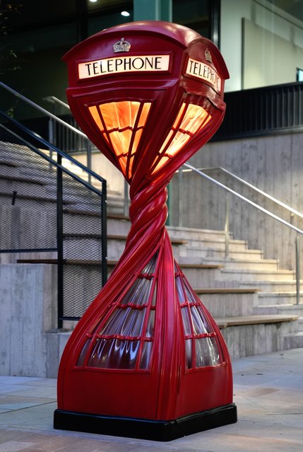 A view of the sculpture “Wring ring”, a traditional British phone box whose body twists through 720 degrees, by artist Alex Chinneck, which is part of his trail of surreal street furniture at Assembly Bristol on Friday, October 25, 2024. (Photo by Andrew Matthews/PA Images via Getty Images)