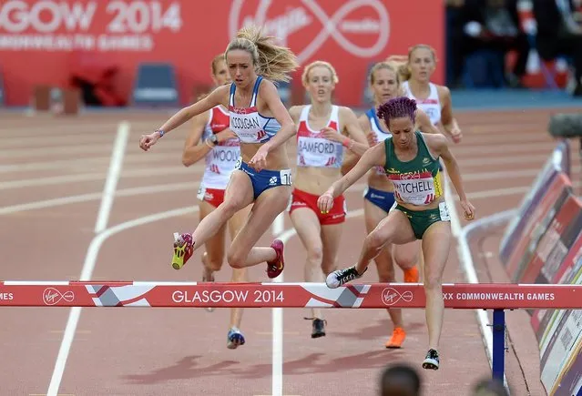 Scotland's Eilish McColgan (left) in the Women's 3000m Steeplechase Final at Hampden Park, during the 2014 Commonwealth Games in Glasgow, on July 30, 2014. (Photo by Martin Rickett/PA Wire)