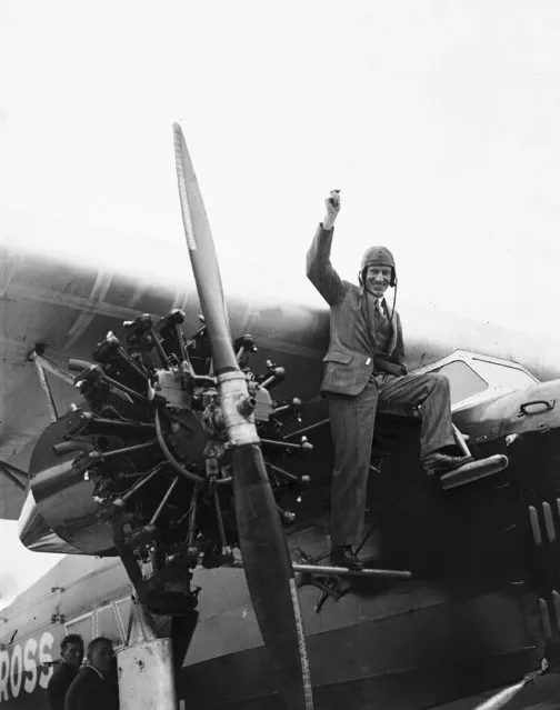Captain Charles Kingsford-Smith waves to friends at Croydon Airport, London, June, 3, 1930, from the “Southern Cross”, the plane he is to fly from Dublin to America. (Photo by AP Photo/Staff/Putnam)