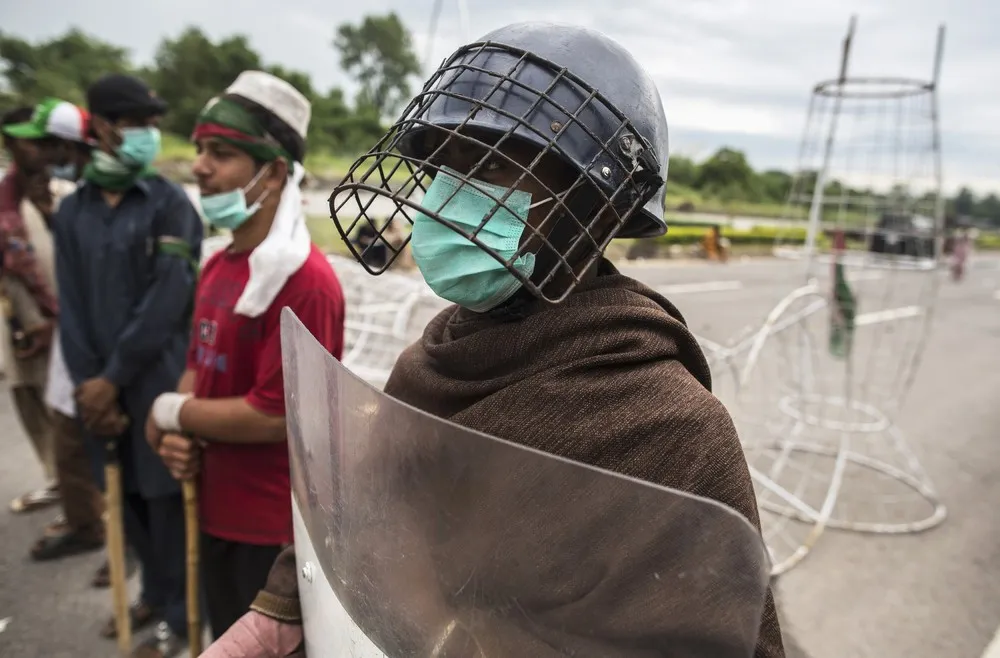 Protesters and Police Clash in Pakistan