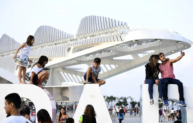 Visitors gather in the plaza outside the newly constructed  Museum of Tomorrow on August 2, 2016 in Rio De Janeiro, Brazil. (Photo by Jonathan Newton/The Washington Post)