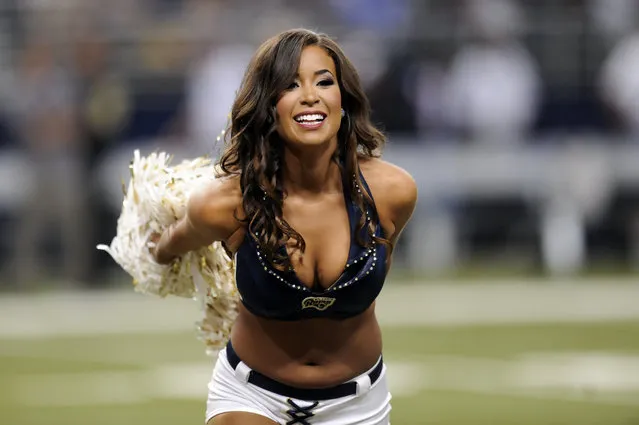 A St. Louis Rams cheerleader performs in the second quarter of a preseason NFL football game Friday, August 8, 2014, in St. Louis. (Photo by L.G. Patterson/AP Photo)