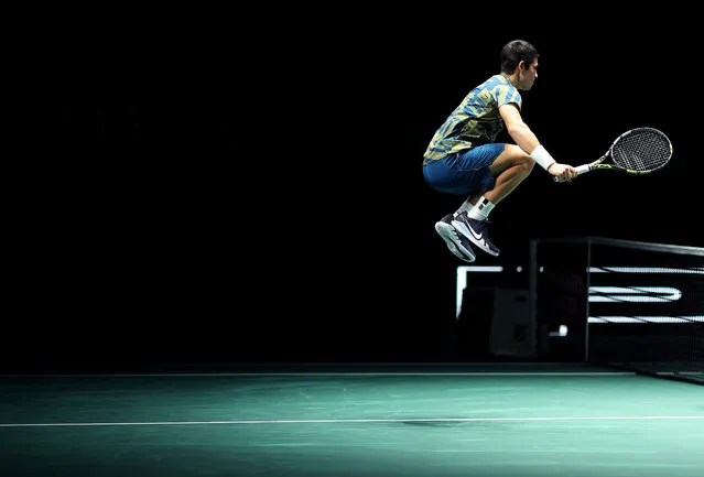 Carlos Alcaraz of Spain jumps in the air before his match with Yoshihito Nishioka of Japan in the second round during Day Three of the Rolex Paris Masters tennis at Palais Omnisports de Bercy on November 2, 2022 in Paris, France. (Photo by Julian Finney/Getty Images)
