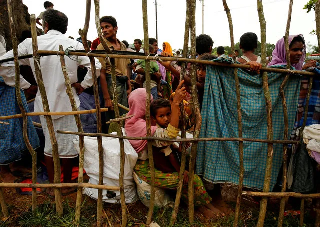 New Rohingya refugees wait to enter the Kutupalang makeshift refugee camp, in Cox’s Bazar, Bangladesh, August 30, 2017. (Photo by Mohammad Ponir Hossain/Reuters)