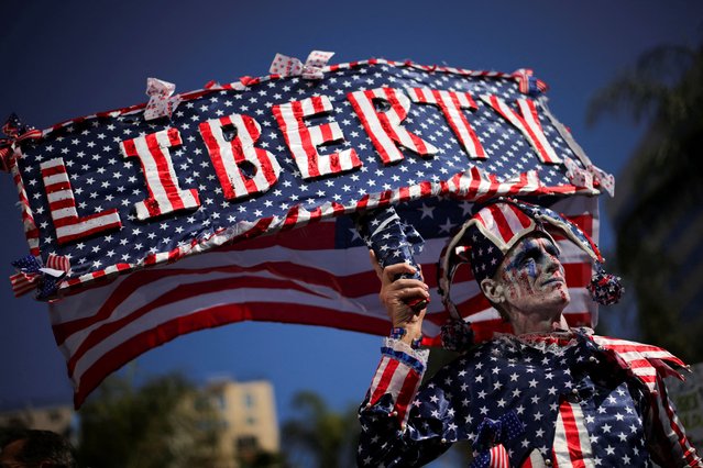 Dan Didi takes part in a “Hands Off!” protest against U.S. President Donald Trump and his adviser Elon Musk, in Los Angeles, California, U.S., April 5, 2025. (Photo by Daniel Cole/Reuters)