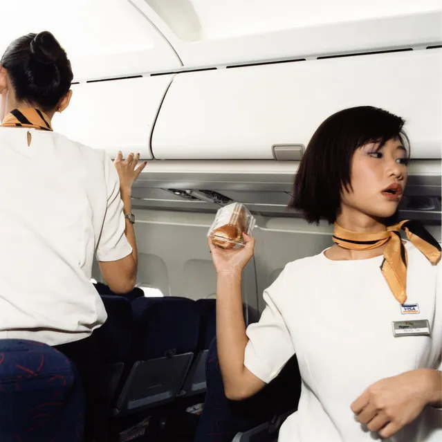 Wenyi and Kate, Tiger Airways, 2006. (Photo by Brian Finke/The Washington Post)