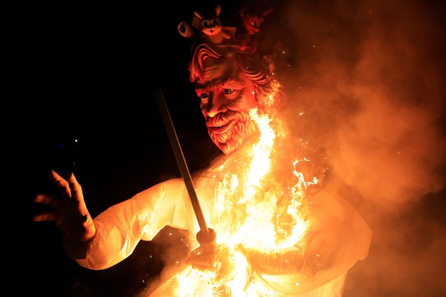 This photograph shows the “Carnival King” burning at the end of the 151th edition of the Nice Carnival, on March 2, 2024. (Photo by Valery Hache/AFP Photo)
