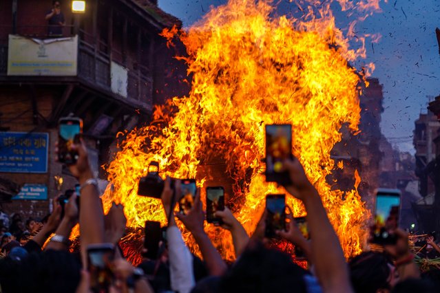 The Newar community burns an effigy of the demon Ghanta Karna on the day of the Gathe Mangal Festival in Bhaktapur, Nepal, on July 23, 2025. (Photo by Ambir Tolang/NurPhoto/Rex Features/Shutterstock)