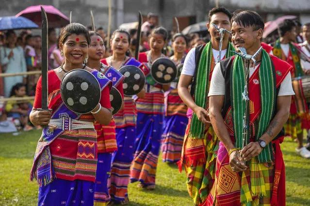 Rabha tribal people in traditional attire perform Rabha dance during Suwori festival in Boko, west of Guwahati, India, Thursday, April 20, 2023. (Photo by Anupam Nath/AP Photo)