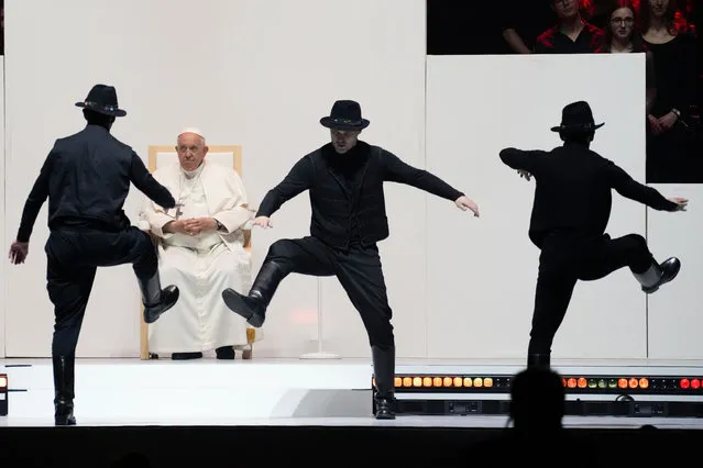Pope Francis looks at dancers during a meeting with young people at the Laszlo Papp Budapest Sports Arena, in Budapest, Hungary, Saturday, April 29, 2023. (Photo by Andrew Medichini/AP Photo)