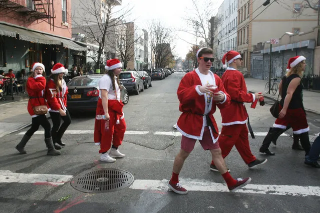 SantaCon 2015 on December 12, 2015. This year it started in Greenpoint Brooklyn at  McCarren park and later in the day will make it's way into the East Village in Manhattan. (Photo by Bruce Cotler/Globe Photos via ZUMA Wire)