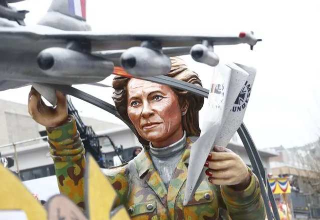 A carnival float with a papier-mache caricature of German Defence Minister Ursula von der Leyen, takes part in the traditional Rose Monday carnival parade in the western German city of Duesseldorf February 16, 2015. (Photo by Ralph Orlowski/Reuters)