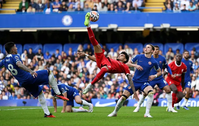 Liverpool's Luis Diaz makes a high kick during the Chelsea-Liverpool match at Stamford Bridge stadium in London, England, on August 13, 2023. (Photo by Tony O'Brien/Reuters)