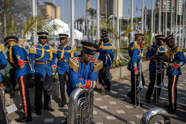 Members of the Kenya Police Service Presidential Band wait for the arrival of African leaders to the Kenyatta International Convention Centre (KICC) during the Africa Climate Summit 2023 in Nairobi on September 6, 2023. (Photo by Luis Tato/AFP Photo)