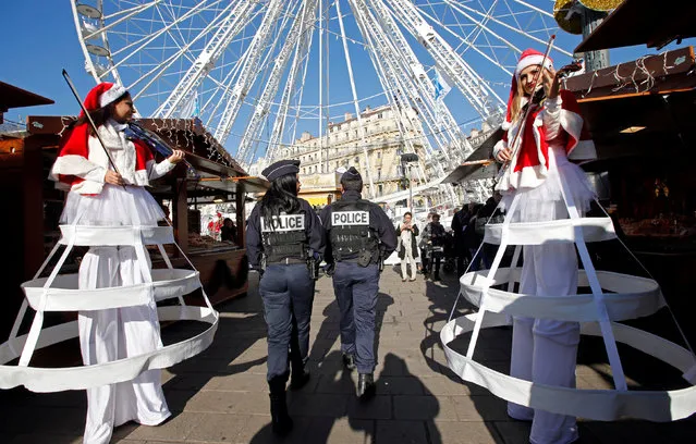 French police officers patrol the Christmas market at the Old Harbour as emergency security measures continue in Marseille, France, December 22, 2016. (Photo by Jean-Paul Pelissier/Reuters)