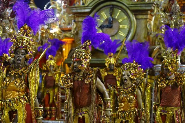 Revellers of Beija-Flor samba school performs during the carnival parade at the Sambadrome in Rio de Janeiro, February 7, 2016. (Photo by Pilar Olivares/Reuters)