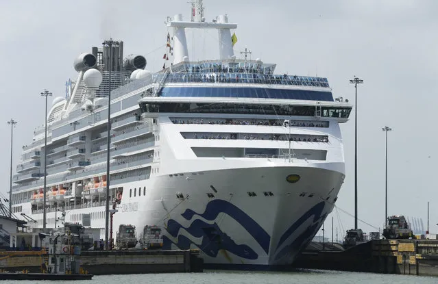In this April 16, 2019 photo, a cruise ship transits through the Pedro Miguel locks of the Panama Canal. An intense drought related to this year's El Nino phenomenon has precipitously lowered the level of Panama's Gatún Lake, forcing the country's Canal Authority to impose draft limits this week on ships moving through the waterway's recently expanded locks. (Photo by Arnulfo Franco/AP Photo)