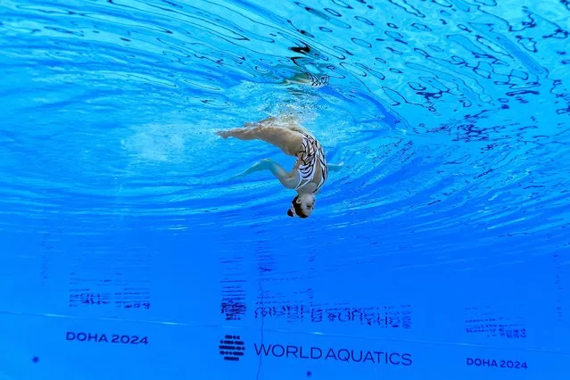 Morocco's Jennah Aida Hafsi in the preliminary round of the women's solo free artistic swimming event during the 2024 World Aquatics Championships at Aspire Dome in Doha on February 4, 2024. (Photo by Manan Vatsyayana/AFP Photo)
